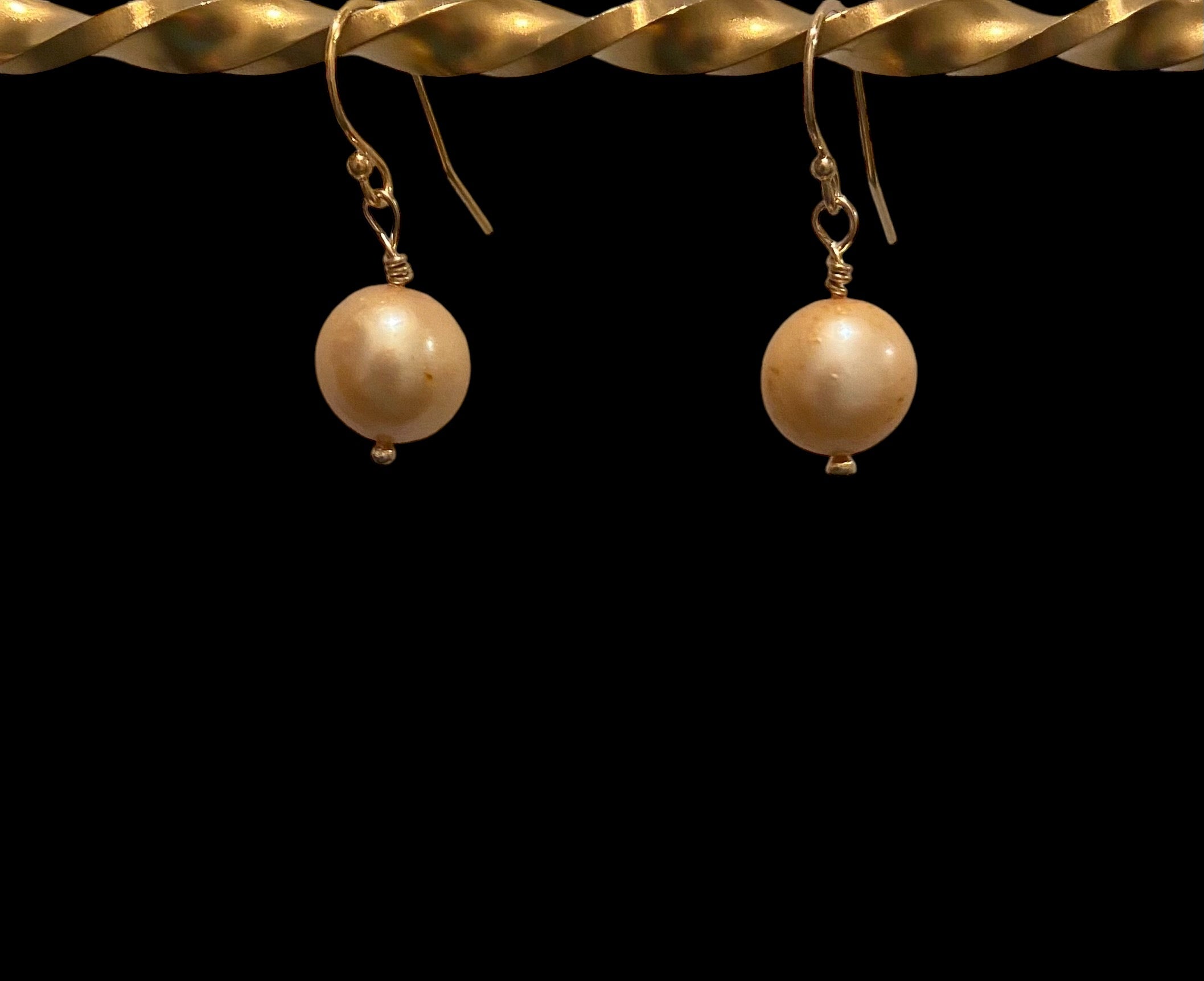 Handcrafted Gold Pearl Earrings with a Glint of Gold