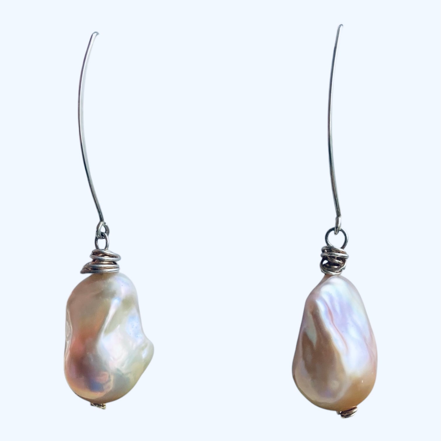 lavender baroque pearls with shimmers of lavender and pinks with hand hammered sterling silver ear wires